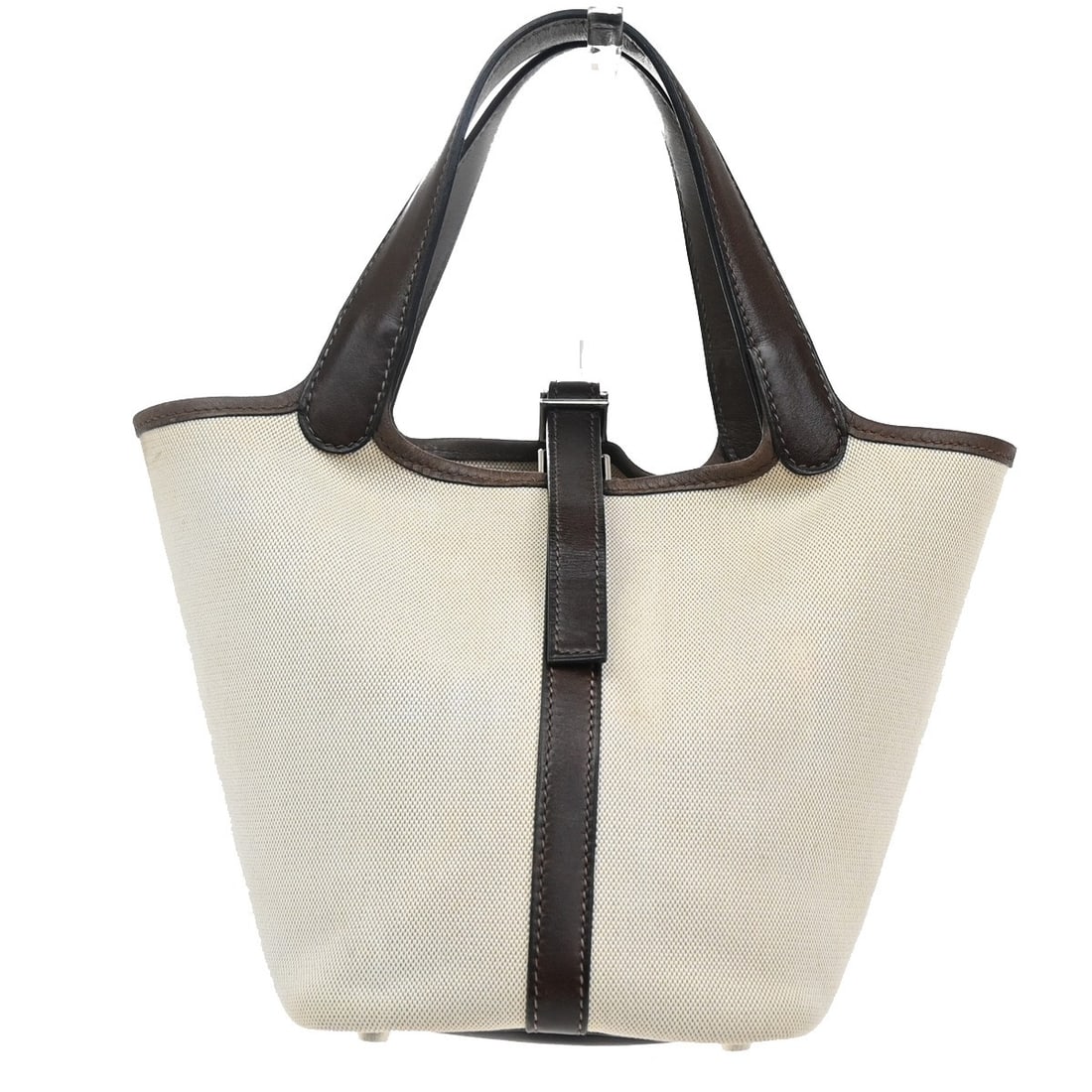Hermes Picotin Beige Canvas Handbag: Hermes Picotin Beige Canvas Handbag This Hermes Picotin bag is crafted from beige canvas with leather accents, offering a timeless and elegant design. Made in France, it features a compact silhouette 