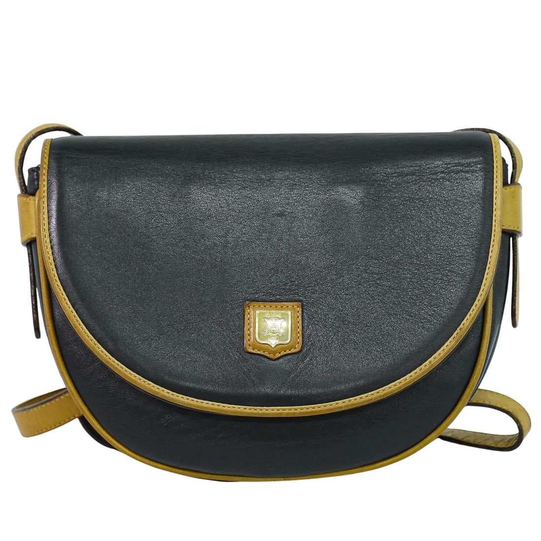 Celine Black Leather Vintage Shoulder Bag from Italy: Celine Black Leather Vintage Shoulder Bag from Italy This Celine vintage shoulder bag is crafted from black leather and designed for women. Made in Italy, the bag features a classic silhouette with no