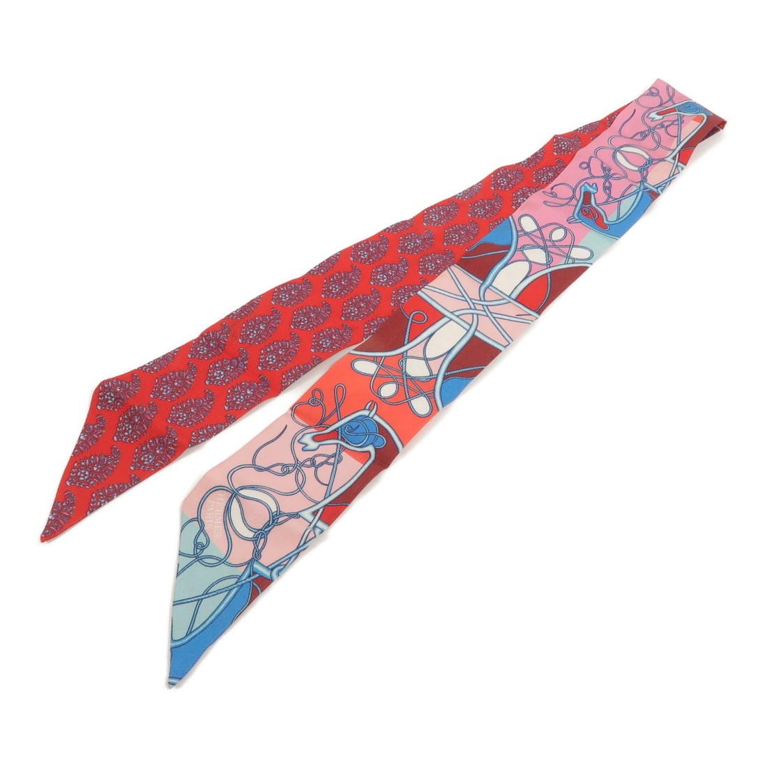 Hermes Twilly silk women scarf in red blue pink: Hermes Twilly silk women scarf in red blue pink This Hermes Twilly scarf is crafted from luxurious silk and features a striking red color with blue and pink accents. Designed for women, it showcases t