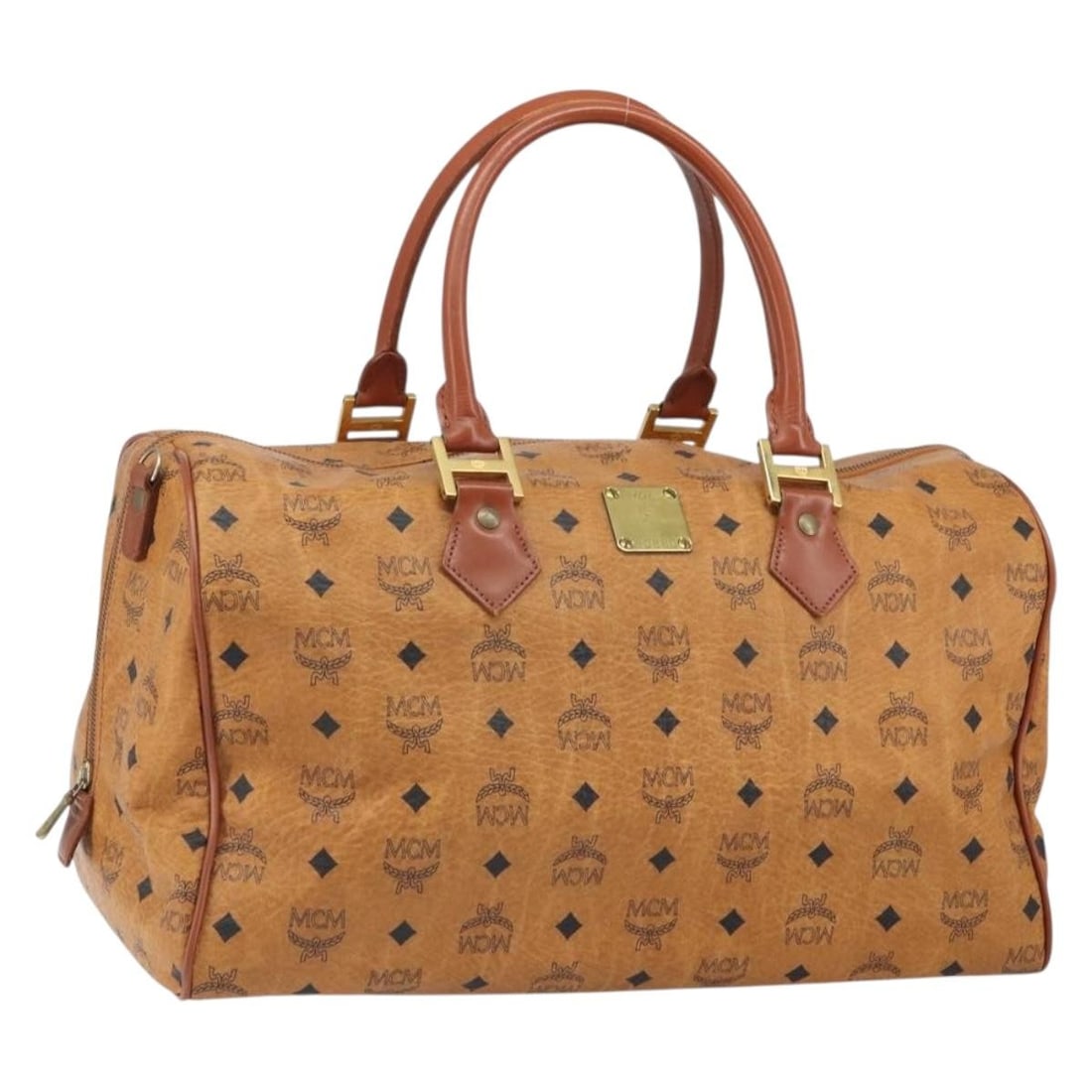 MCM Boston Bag Brown PVC Leather Gold Accents Germany: MCM Boston Bag Brown PVC Leather Gold Accents Germany This MCM Boston bag features the iconic Visetos logogram on brown and gold PVC leather. Designed for women, it is crafted in Germany and offers a 