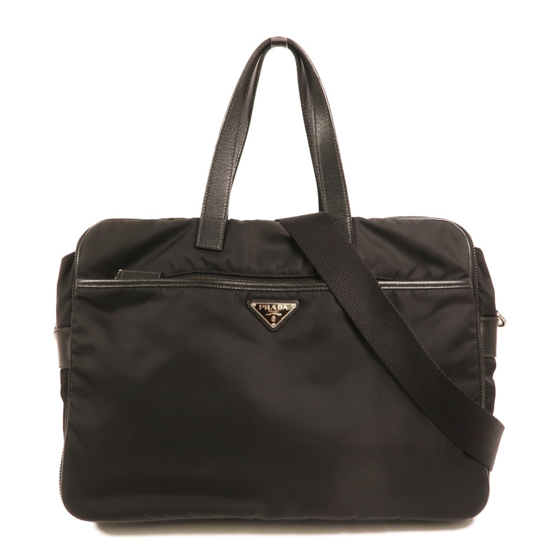 Prada Black Nylon Two Way Shoulder Bag With Silver Hardware: Prada Black Nylon Two Way Shoulder Bag With Silver Hardware This PRADA 2-way shoulder bag features a versatile design crafted from durable black nylon. Suitable for unisex use, the bag offers both sho