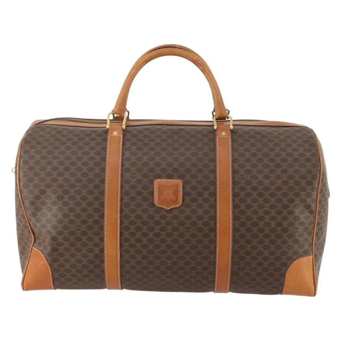 Celine Macadam coated canvas duffle bag: Celine Macadam coated canvas duffle bag This Celine vintage duffle bag features the iconic Macadam pattern on coated canvas, complemented by brown leather accents. Designed for unisex use, the bag was