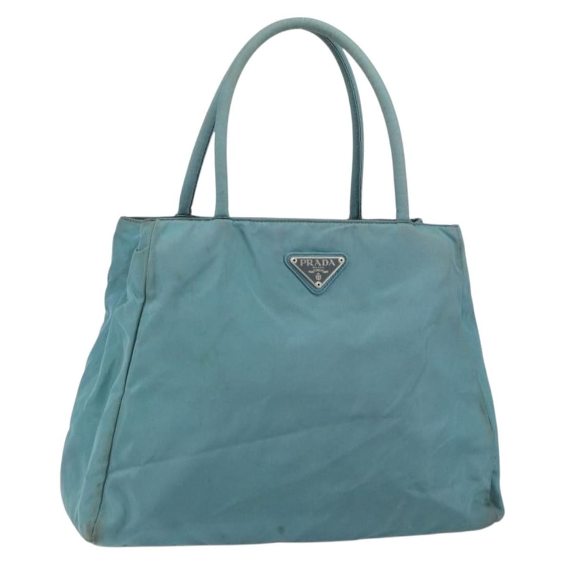 Prada blue nylon women s handbag Italy 12.6 x 9.8 x 4.3 inch: Prada blue nylon women s handbag Italy 12.6 x 9.8 x 4.3 inch This PRADA handbag is crafted from durable nylon in blue and silver tones, offering a stylish and practical accessory for women. Made in It