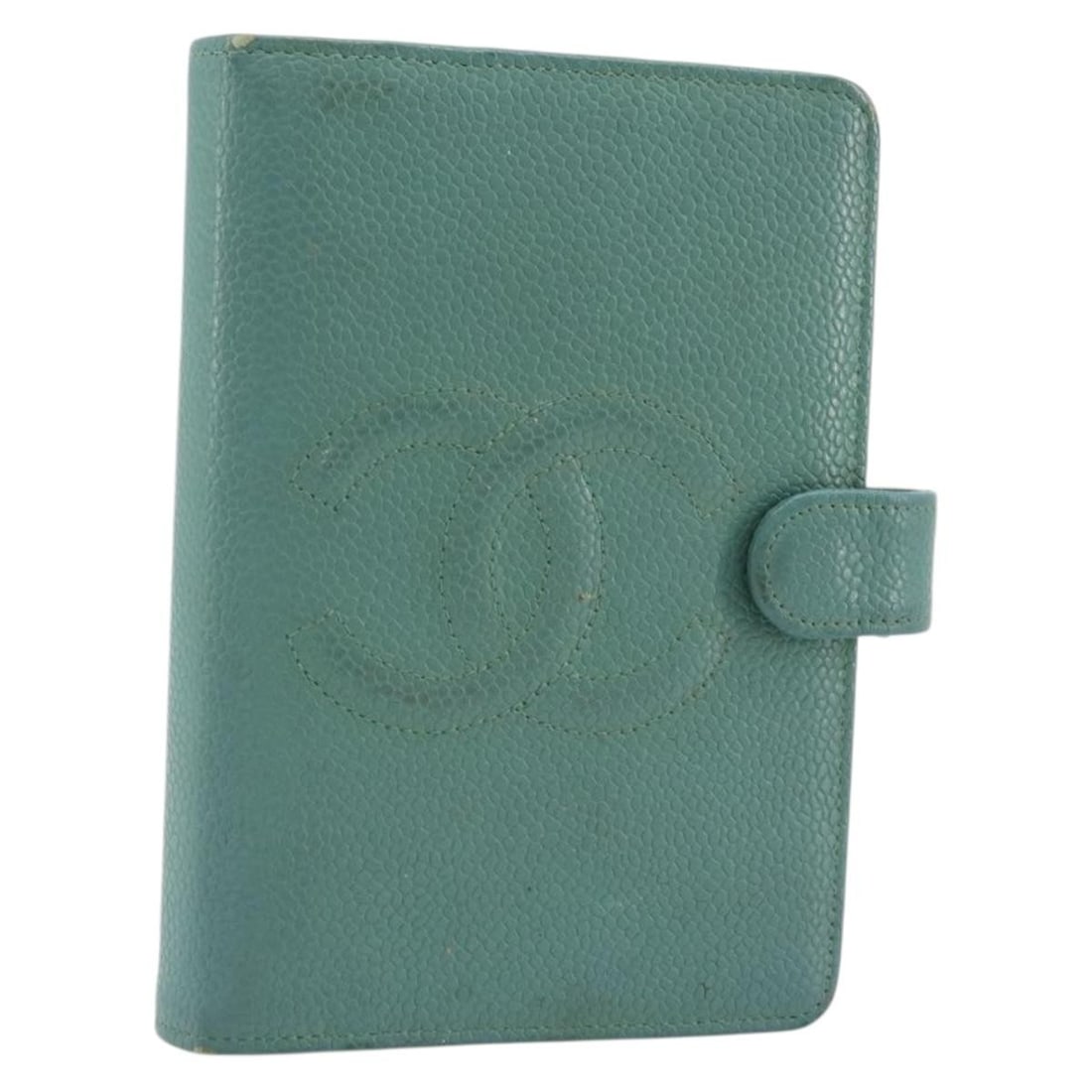 CHANEL green gold day planner cover caviar skin CC auth: CHANEL green gold day planner cover caviar skin CC auth This CHANEL Coco Mark day planner cover is crafted from green caviar skin calf leather with gold-tone CC detailing. Made in France, it features 