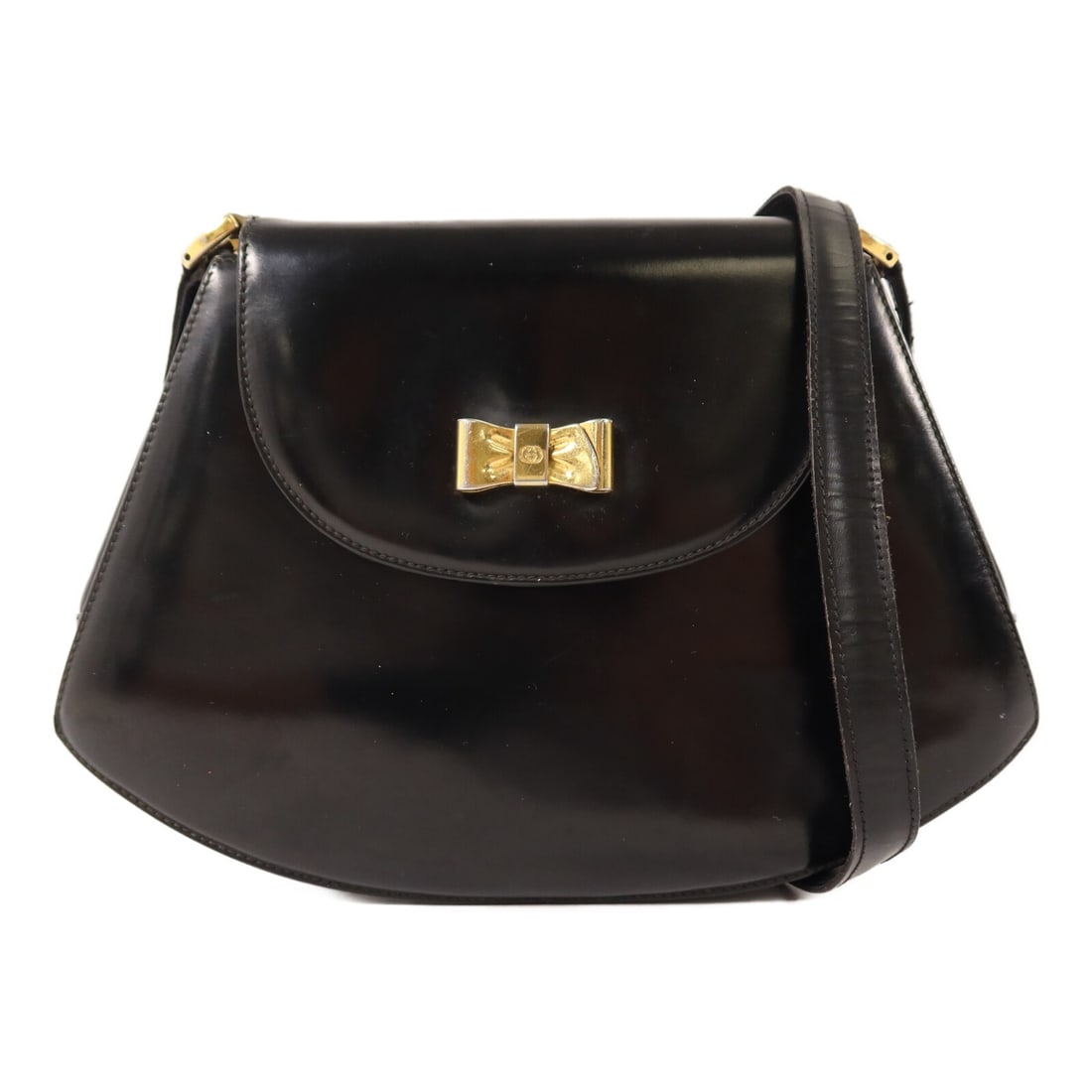 Gucci Black Calfskin GG Shoulder Bag GHW Vintage: Gucci Black Calfskin GG Shoulder Bag GHW Vintage This vintage GUCCI GG shoulder bag is crafted from black calfskin leather and features gold-tone hardware. Designed for women, the bag offers a compact