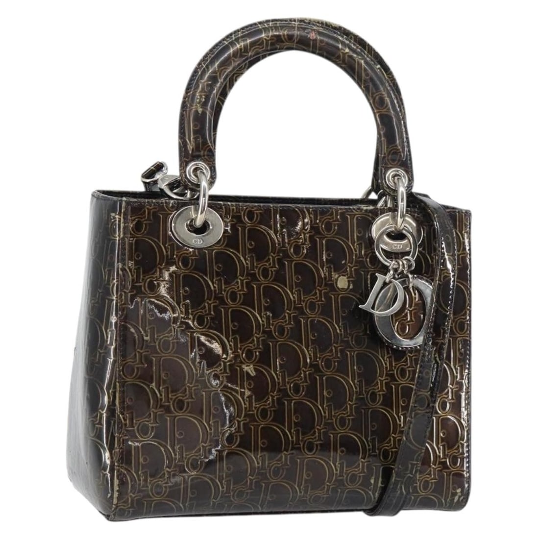 Christian Dior Trotter Canvas Brown Silver 2way Hand Bag Authentic: Christian Dior Trotter Canvas Brown Silver 2way Hand Bag Authentic This authentic Christian Dior Trotter Canvas Hand Bag combines elegance and functionality. Crafted in Italy, the bag features a styli