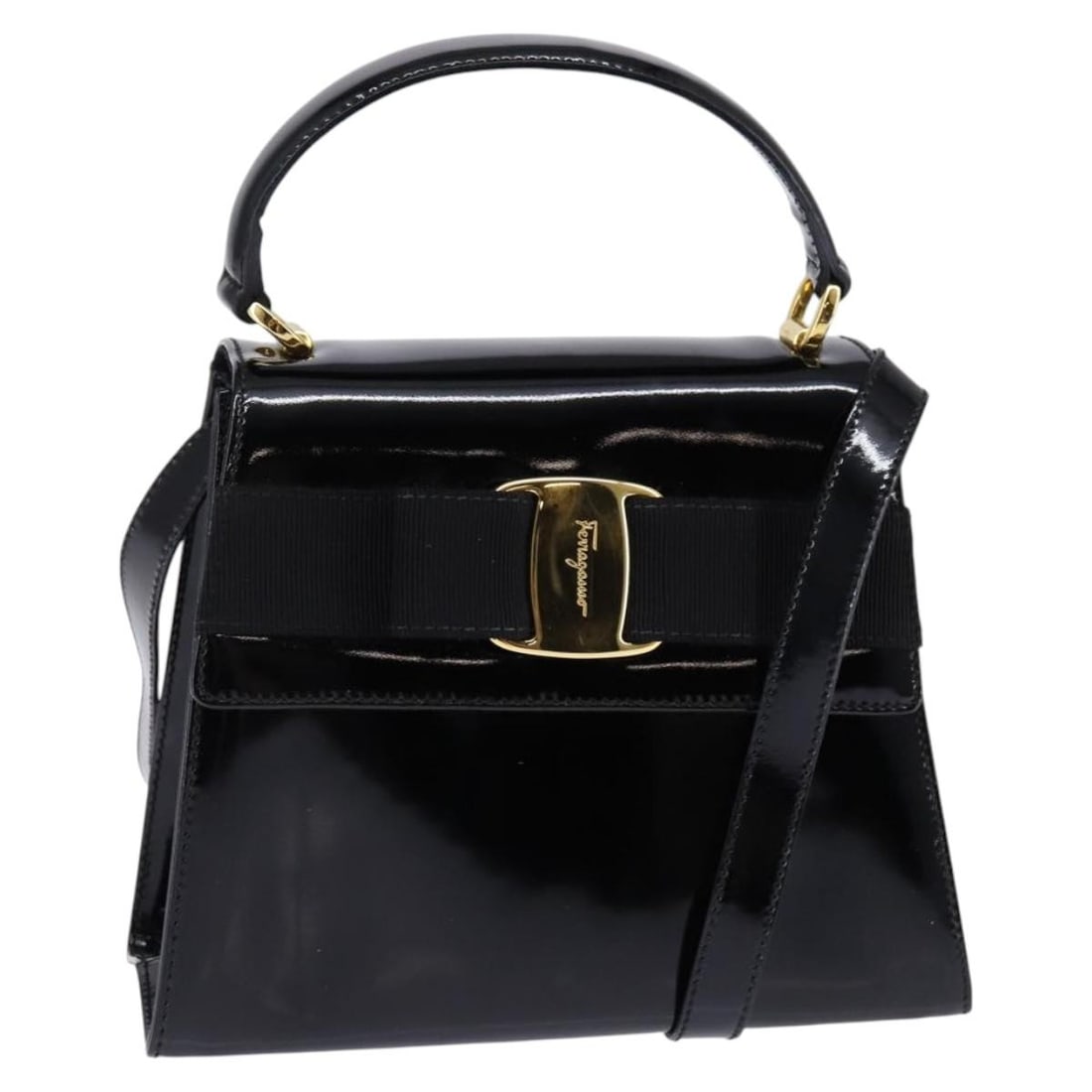 Salvatore Ferragamo Vala Black Gold Enamel Hand Bag Authentic 147507: Salvatore Ferragamo Vala Black Gold Enamel Hand Bag Authentic 147507 This exquisite Salvatore Ferragamo Vala Hand Bag features a sleek black and gold enamel exterior, making it a stylish accessory for