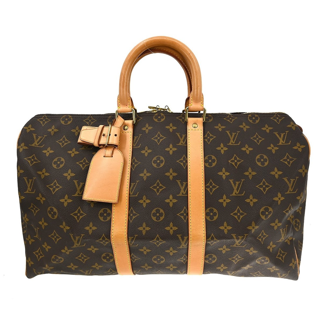 Louis Vuitton Keepall Canvas Travel Bag with Handle Holder and Name Tag: Louis Vuitton Keepall Canvas Travel Bag with Handle Holder and Name Tag This Louis Vuitton Keepall Bag features the iconic monogram canvas in brown and is designed for unisex use. The bag shows visibl