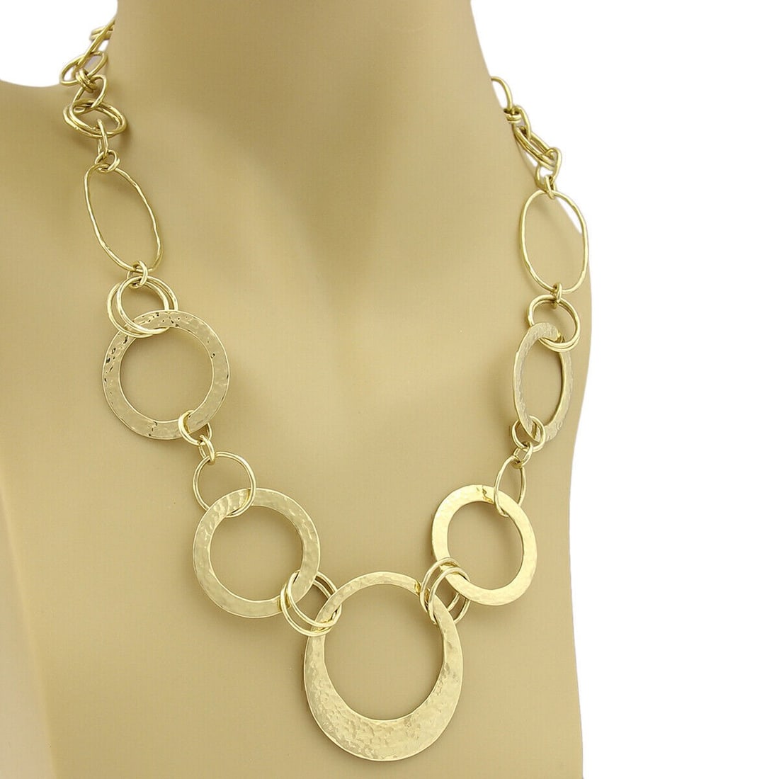 Ippolita 18k Yellow Gold Hammered Open Circle Link Necklace: Ippolita 18k Yellow Gold Hammered Open Circle Link Necklace This authentic Ippolita necklace features a distinctive design of assorted open circular links crafted from 18k yellow gold. The necklace sh
