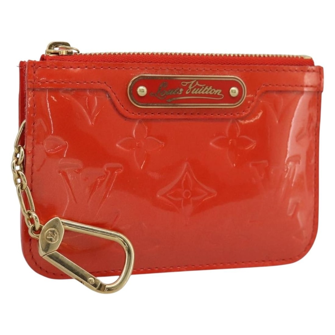 Louis Vuitton Vernis Pochette Cles NM Patent Leather Coin Purse: Louis Vuitton Vernis Pochette Cles NM Patent Leather Coin Purse This Louis Vuitton Vernis Pochette Cles NM coin purse is crafted from patent leather in the Orenge Sunset color. Designed for women, it 