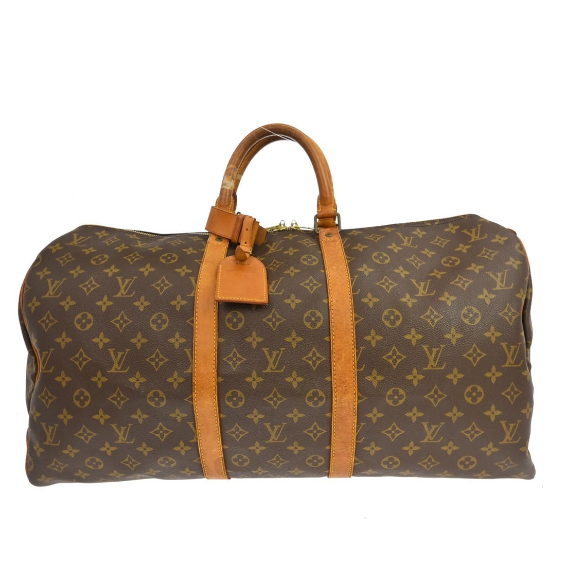 Louis Vuitton Keepall 55 Monogram Duffle Bag: Louis Vuitton Keepall 55 Monogram Duffle Bag This Louis Vuitton Keepall 55 is a vintage extra-large duffle travel handbag crafted from signature monogram canvas leather with beige leather double handl
