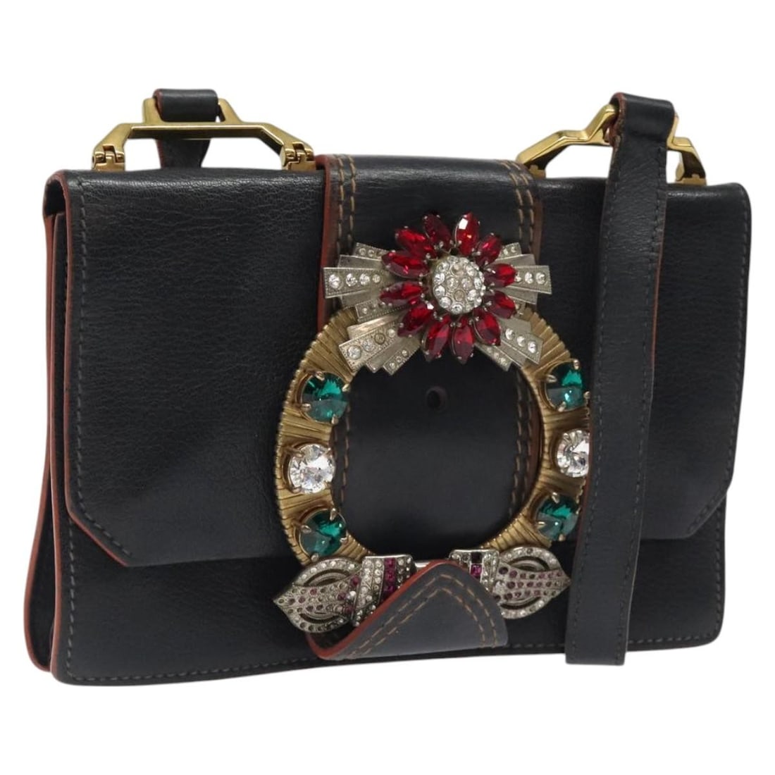 Miu Miu Black Leather Shoulder Bag with Gold Accents: Miu Miu Black Leather Shoulder Bag with Gold Accents This Miu Miu shoulder bag is crafted from black leather with gold accents, designed for women. The bag features a compact structure with a shoulder