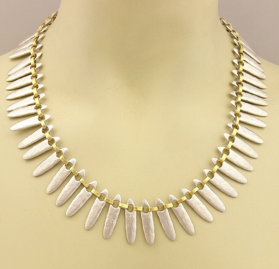 Gurhan Sunflower 19 Sterling Silver 24k Gold Overlay Necklace: Gurhan Sunflower 19 Sterling Silver 24k Gold Overlay Necklace This Gurhan Sunflower collection necklace is crafted from sterling silver with a 24k gold overlay. Featuring dramatic hammered shark-tooth
