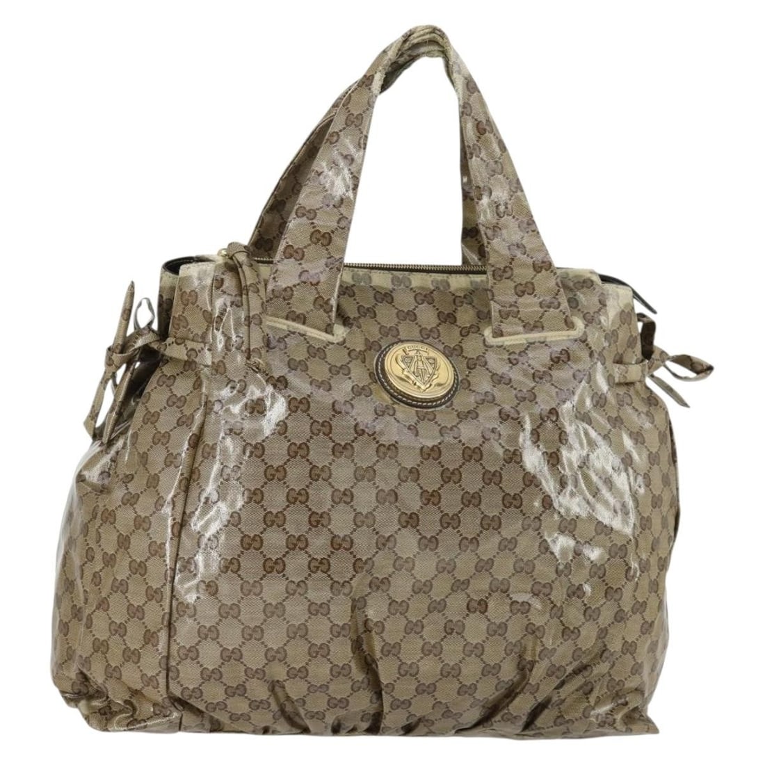 Beige Gold GG Crystal Tote by Gucci 197022 Coated Canvas: Beige Gold GG Crystal Tote by Gucci 197022 Coated Canvas This is a GUCCI GG Crystal Tote Bag crafted from coated canvas in beige and gold tones. Designed for women, the tote features the iconic GG mon