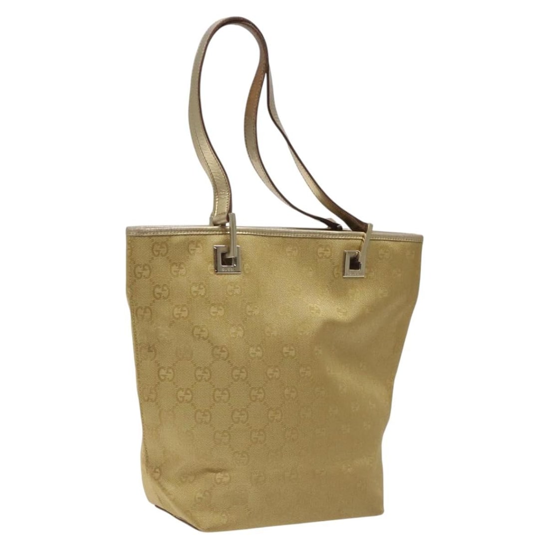 Gucci GG Canvas Gold Tote Bag 002 1099 Italy: Gucci GG Canvas Gold Tote Bag 002 1099 Italy This GUCCI GG Canvas Tote Bag features gold-tone GG canvas with matching gold leather accents. Designed for women, it offers a spacious interior and practi