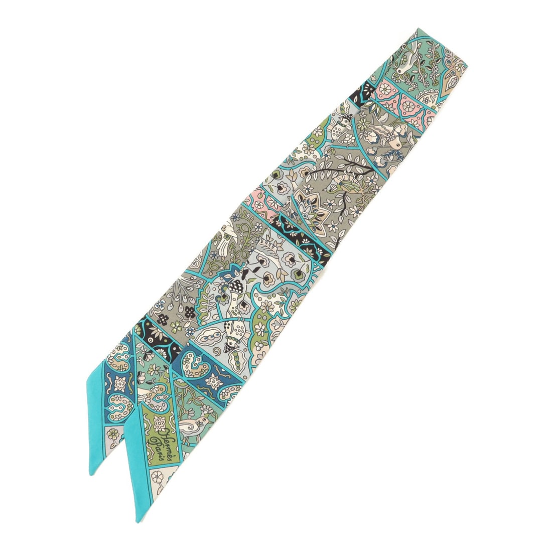 Hermes Green Silk Twilly Scarf: Hermes Green Silk Twilly Scarf This Hermes Twilly scarf is crafted from luxurious silk in a vibrant green color. Designed for women, it features a regular size and showcases the quality and elegance a