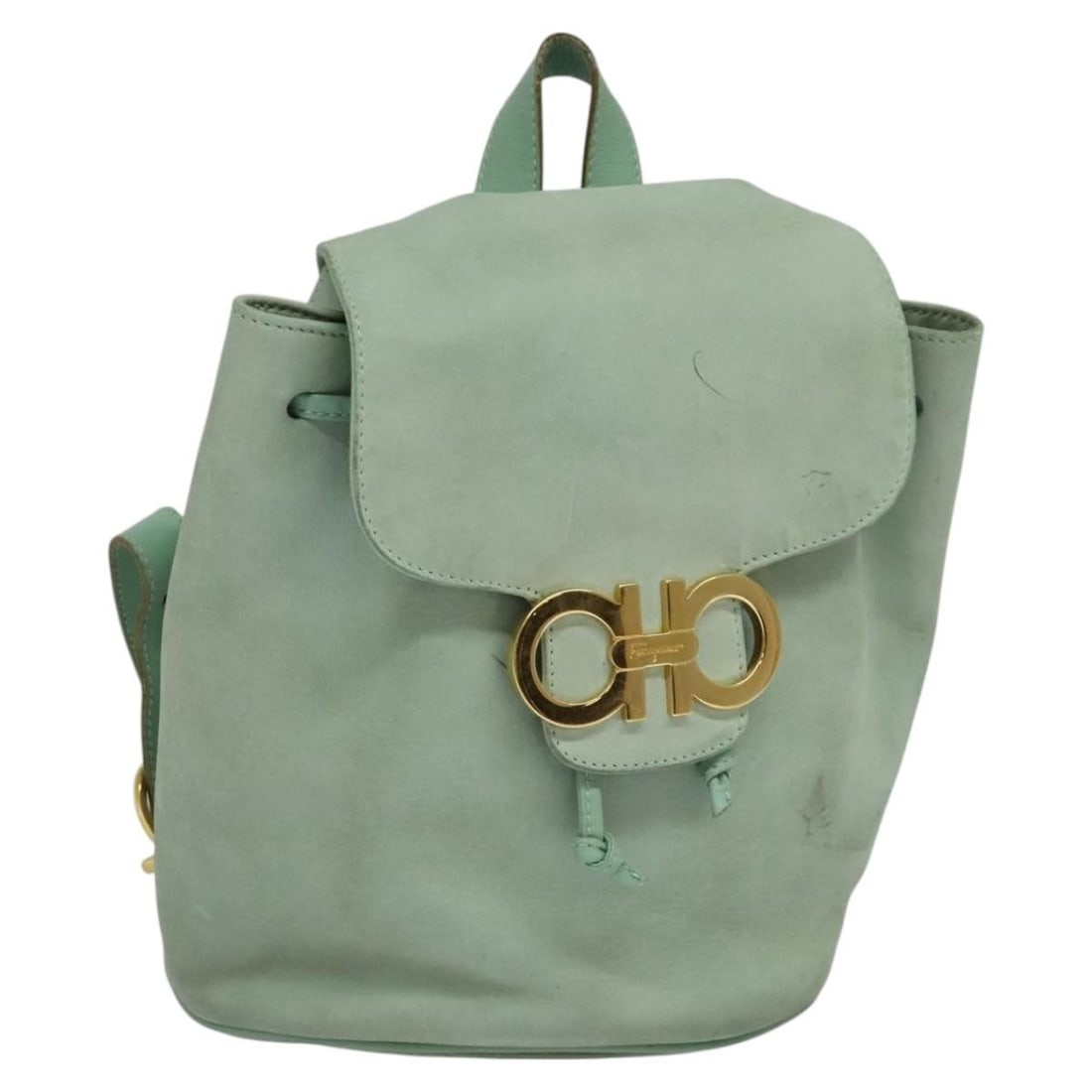 Peppermint Suede Ferragamo Backpack with Gold Accents for Women: Peppermint Suede Ferragamo Backpack with Gold Accents for Women This Salvatore Ferragamo women's backpack is crafted from suede in a peppermint and gold color combination. The bag features a compact d