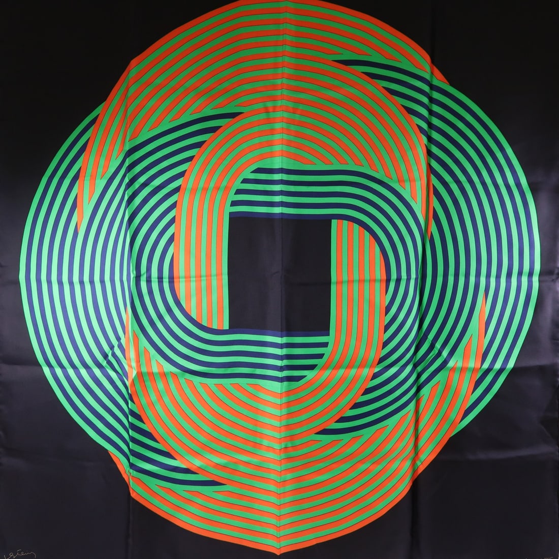 Silk Scarf by HERMES in Black Green and Orange: Silk Scarf by HERMES in Black Green and Orange This HERMES scarf is crafted from silk and features a striking combination of black, green, and orange colors. Designed for women, it offers an elegant a