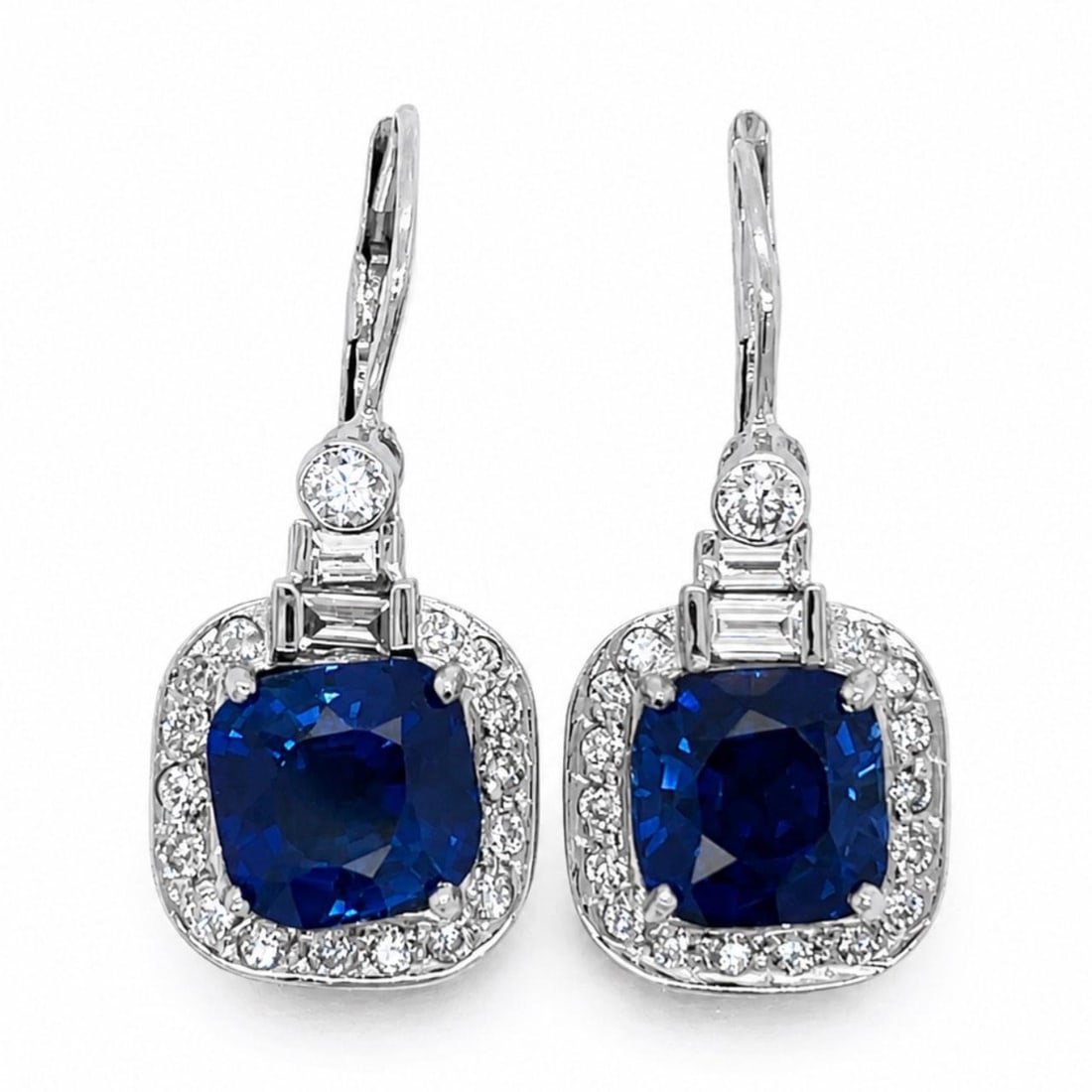 14K White Gold Earrings with Synthetic Sapphires and Diamonds: 14K White Gold Earrings with Synthetic Sapphires and Diamonds These elegant earrings are crafted from 14K white gold and feature two synthetic sapphires with a total weight of approximately 12.00 cara
