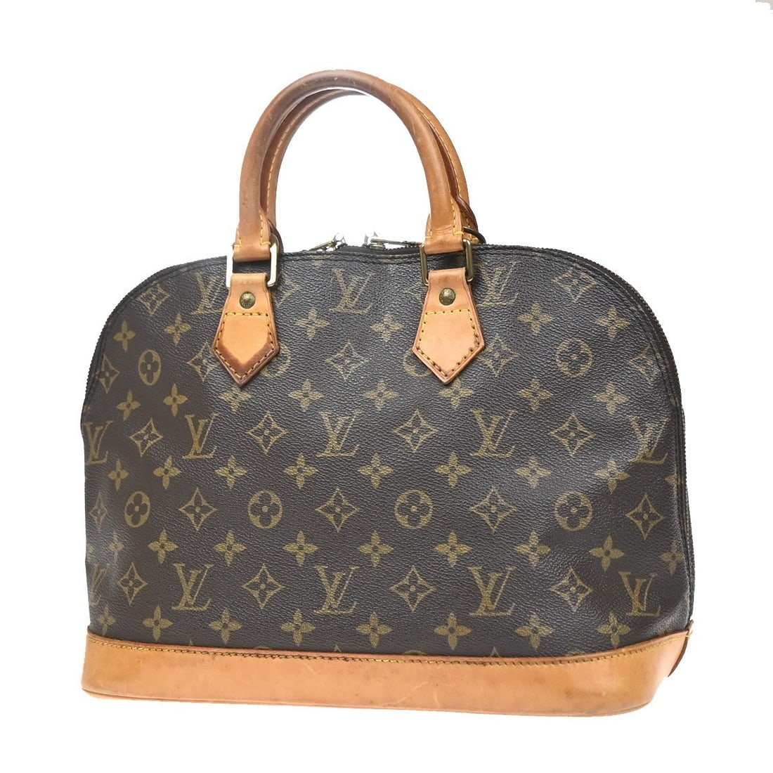 Louis Vuitton Alma Brown Canvas Handbag 30cm x 24cm x 16cm: Louis Vuitton Alma Brown Canvas Handbag 30cm x 24cm x 16cm This Louis Vuitton Alma handbag features the iconic monogram canvas in brown, designed for women. The bag is crafted in France and offers a s