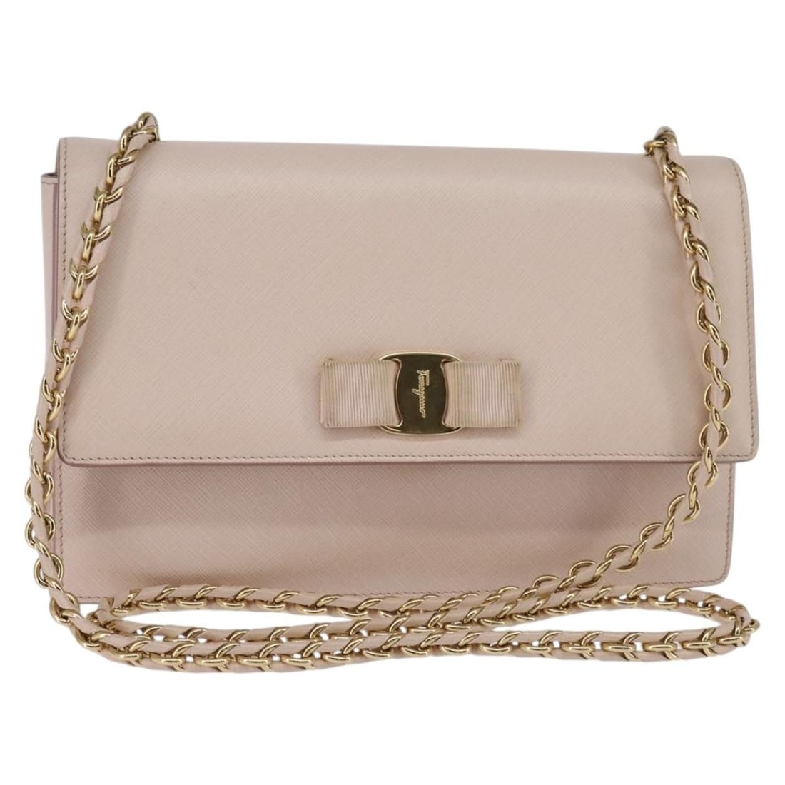 Pink Leather Ginny Crossbody by Salvatore Ferragamo: Pink Leather Ginny Crossbody by Salvatore Ferragamo The Salvatore Ferragamo Ginny Crossbody Bag is crafted from pink leather and features a chain shoulder strap. This pre-owned bag is in good conditio