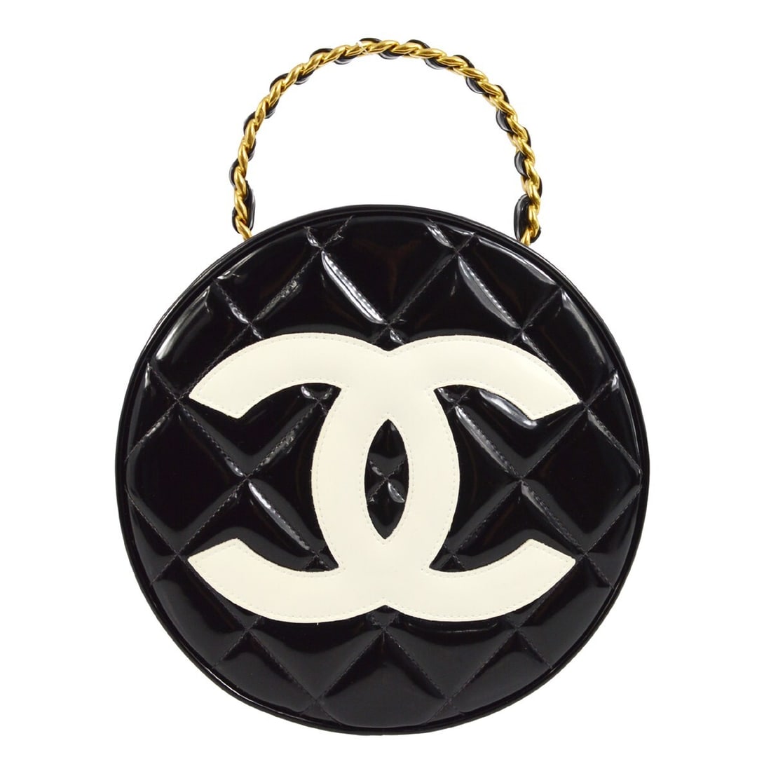 Chanel Black Patent Leather Round Vanity Handbag 9in Quilted Top Handle: Chanel Black Patent Leather Round Vanity Handbag 9in Quilted Top Handle This Chanel Black Patent Leather Round Vanity Handbag is a stylish accessory that combines elegance with practicality. With a ro