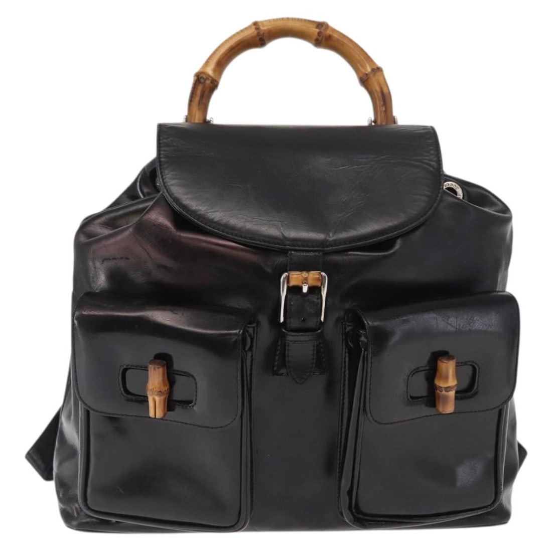 Black Leather Gucci Bamboo Vintage Backpack 30cm by 26cm by 8cm: Black Leather Gucci Bamboo Vintage Backpack 30cm by 26cm by 8cm This Gucci Vintage Bamboo Backpack for women is crafted from black leather and features signature bamboo handle details. It shows signs 