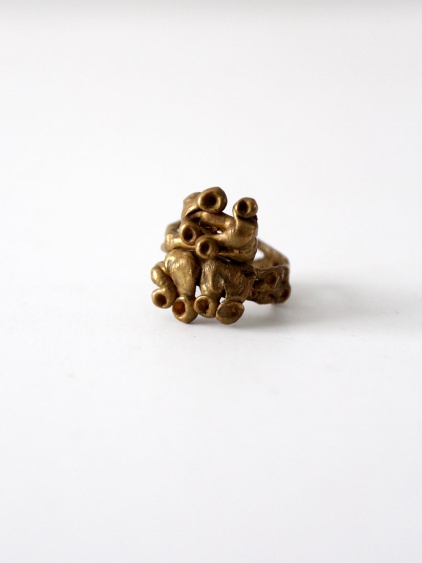 1970s Vintage Brutalist Bronze Ring Size 8: 1970s Vintage Brutalist Bronze Ring Size 8 This striking vintage brutalist ring, crafted in the 1970s, showcases a unique hand-crafted design in bronze. The ring features a bold modernist style, highl