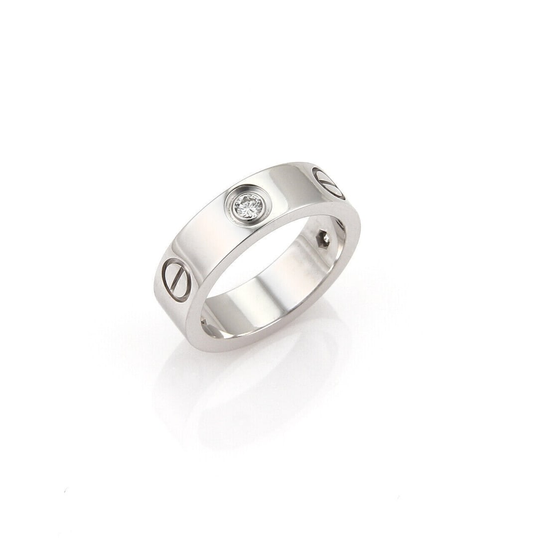 Cartier Love ring 18k white gold 3 diamonds certificate size 5: Cartier Love ring 18k white gold 3 diamonds certificate size 5 This authentic Cartier Love ring is crafted from 18k white gold and features the iconic screw motif that characterizes the Love collectio