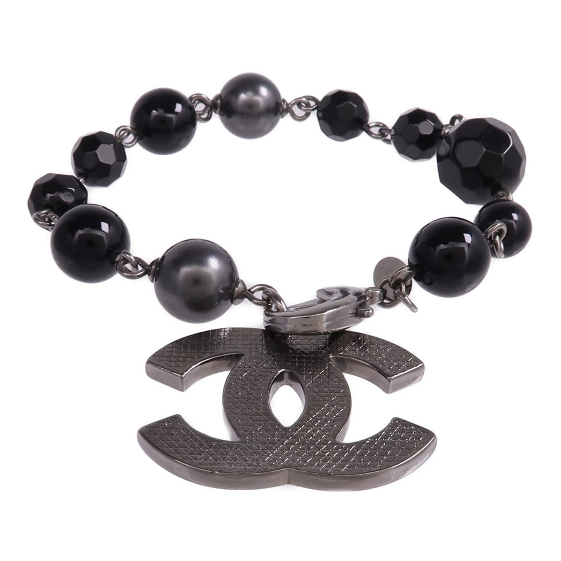 Chanel Black and Silver PVC CC Logo Women's Bracelet: Chanel Black and Silver PVC CC Logo Women's Bracelet This CHANEL bracelet features a stylish combination of black and silver tones, crafted from PVC and metal. Designed for women, it showcases the ico