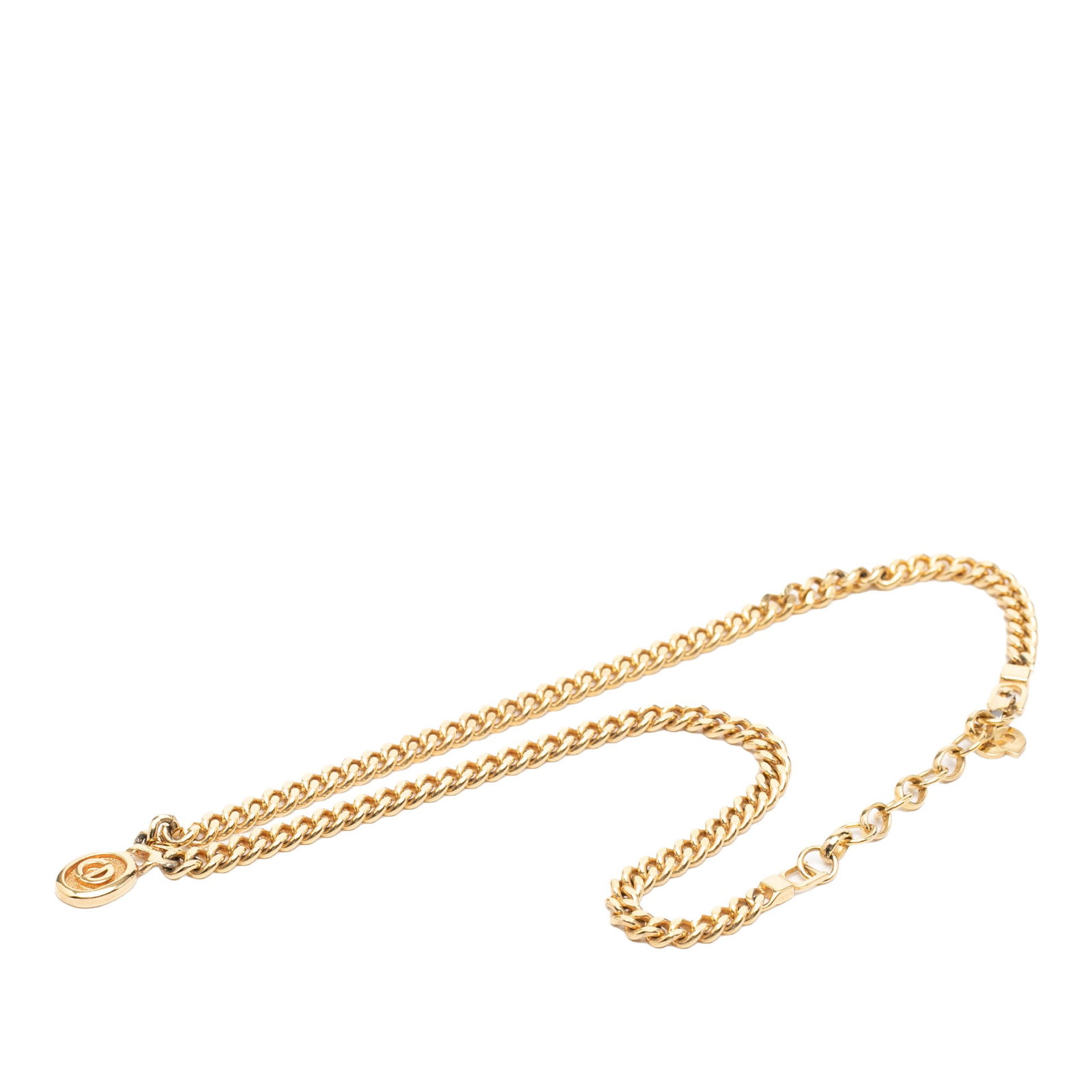 Dior oval pendant necklace gold tone CD logo: Dior oval pendant necklace gold tone CD logo This Dior necklace features a gold tone metal construction with an oval pendant showcasing the iconic CD logo. It is designed with a fold over clasp closur