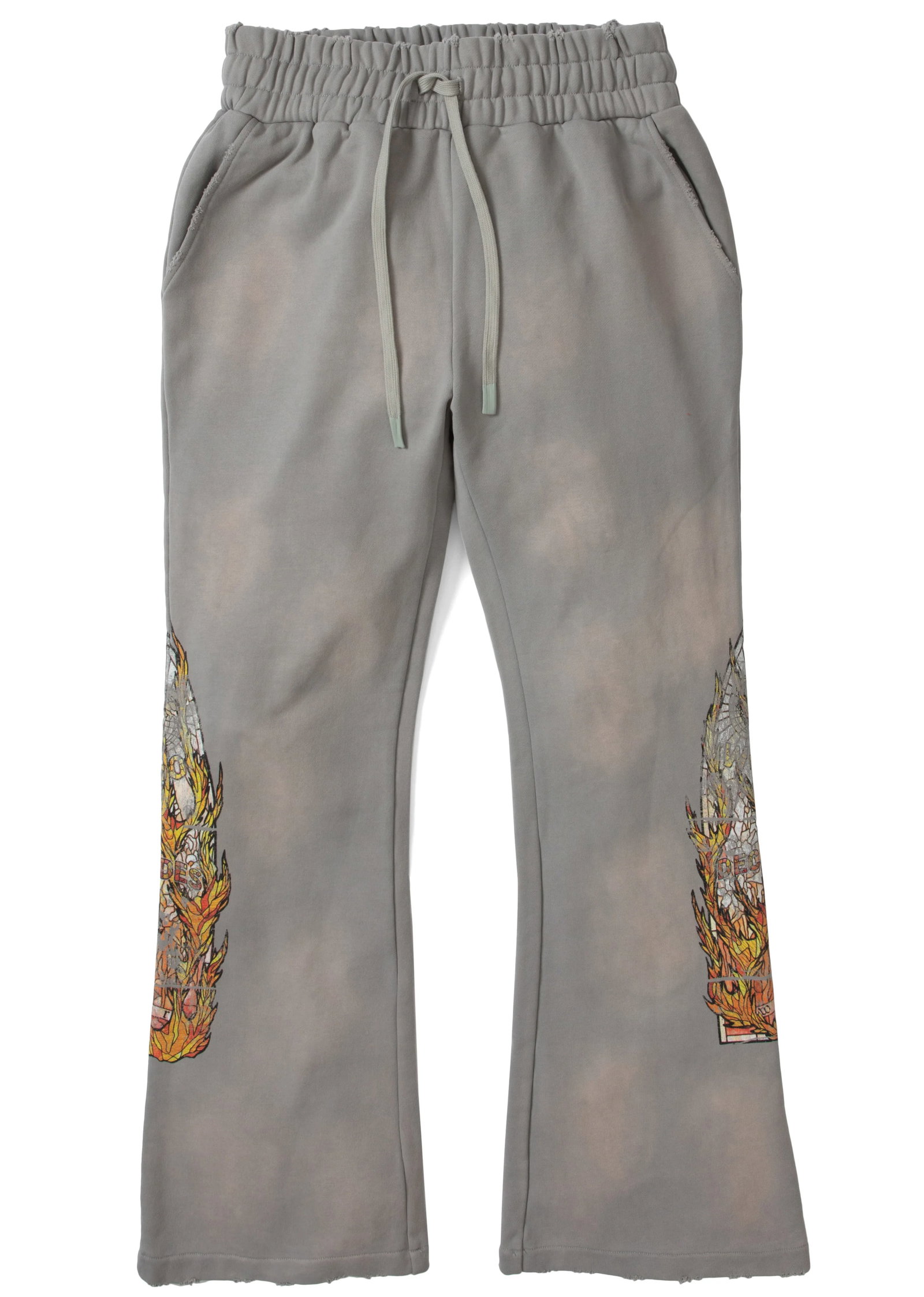 Faded Grey Flame Glass Sweatpants by Who Decides War: Faded Grey Flame Glass Sweatpants by Who Decides War The Who Decides War Flame Glass Faded Grey Sweatpants feature a washed grey finish with flame glass detailing and a flared silhouette. These sweatp