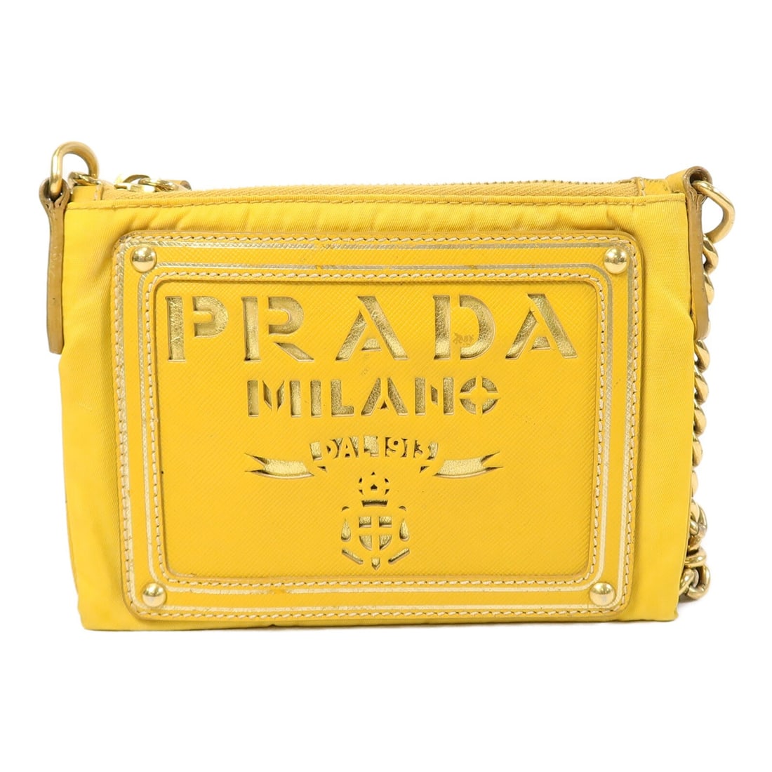 Prada GHW Yellow Nylon Shoulder Bag: Prada GHW Yellow Nylon Shoulder Bag This Prada shoulder bag features a vibrant yellow nylon exterior and a sleek chain strap design. Crafted in Italy, the bag is tailored for women and offers a compac