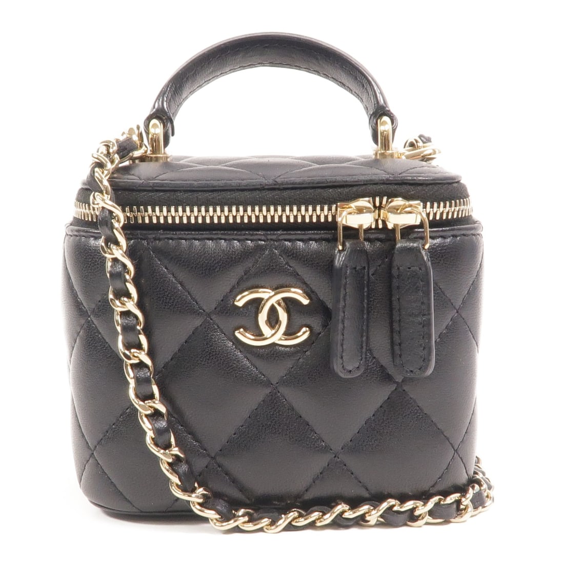 Chanel CC GHW Mini Vanity 2 Way Shoulder Bag Black Lambskin: Chanel CC GHW Mini Vanity 2 Way Shoulder Bag Black Lambskin This Chanel CC Mini Vanity Case is a versatile 2-way shoulder bag crafted from luxurious lambskin leather. The bag features a compact design