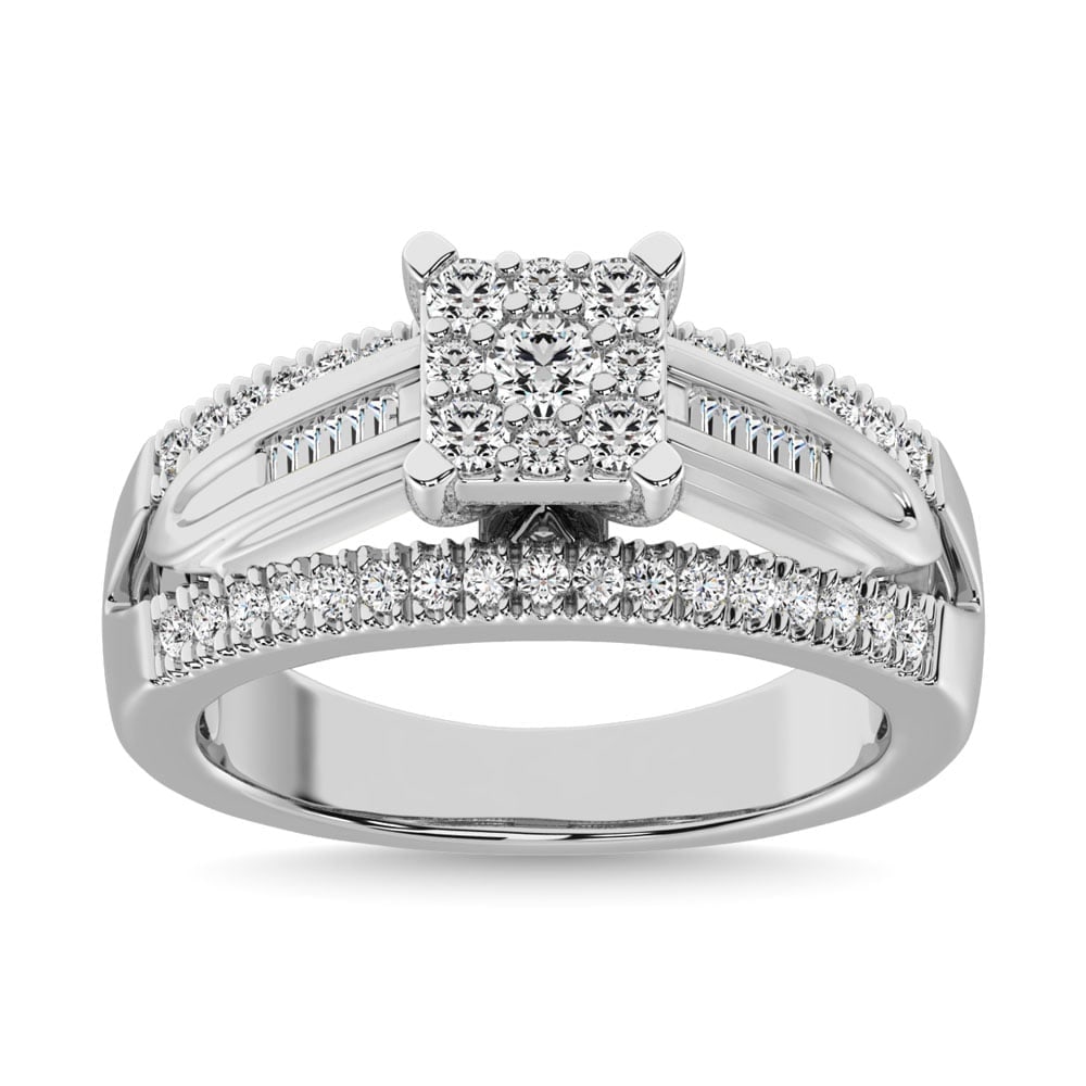 10K White Gold 1/2 Ct.Tw. Diamond Engagement Invisible Ring: 10K White Gold 1/2 Ct.Tw. Diamond Engagement Invisible Ring This amazing Engagement Ring is available in 10K White Gold. There are 55 round / tapper diamonds with a total carat weight of 1/2 Ct.Tw. se