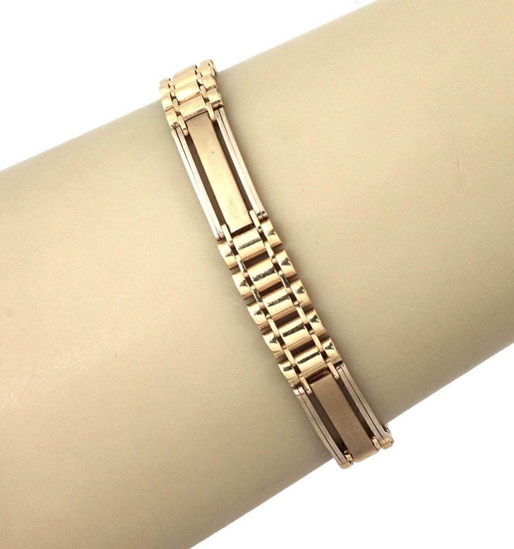 Vintage 14k Yellow Gold Long Bar Link Bracelet: Vintage 14k Yellow Gold Long Bar Link Bracelet This vintage estate bracelet is crafted from solid 14k yellow gold and features an elegant long bar link design. The polished finish highlights its sculp