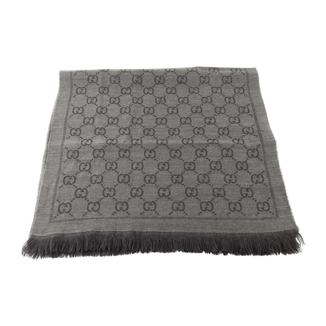 Gucci GG Wool Scarf 180x48cm Dark Grey: Gucci GG Wool Scarf 180x48cm Dark Grey This GUCCI scarf features a dark grey color and is crafted from high-quality wool. Designed for unisex wear, it combines luxury with versatility. Made in Italy, 