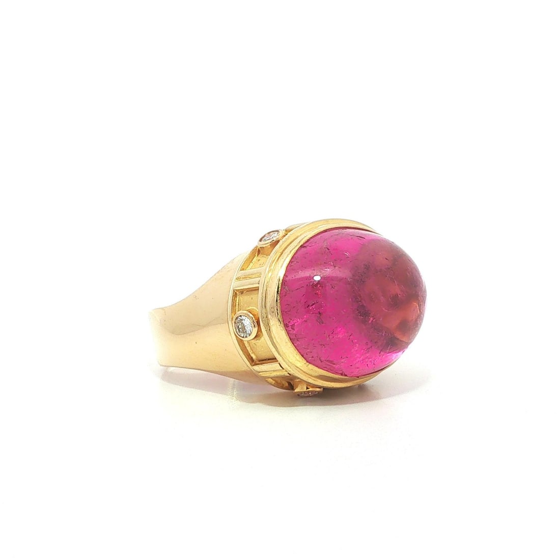 GIA certified oval pink tourmaline diamond cocktail ring 18k yellow gold size 7: GIA certified oval pink tourmaline diamond cocktail ring 18k yellow gold size 7 This women's cocktail ring features a natural oval double cabochon cut tourmaline in a purplish pink hue, bezel set in s