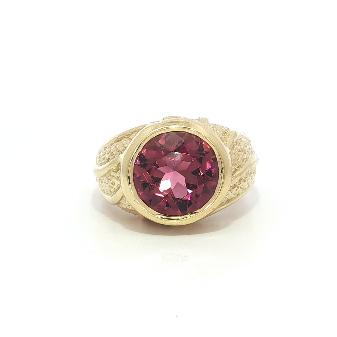 18k Yellow Gold GIA Certified 5ct Vivid Pink Tourmaline Cocktail Ring: 18k Yellow Gold GIA Certified 5ct Vivid Pink Tourmaline Cocktail Ring This stunning cocktail ring features a substantial 5.0ct round brilliant cut vivid pink tourmaline, elegantly bezel set in solid 1