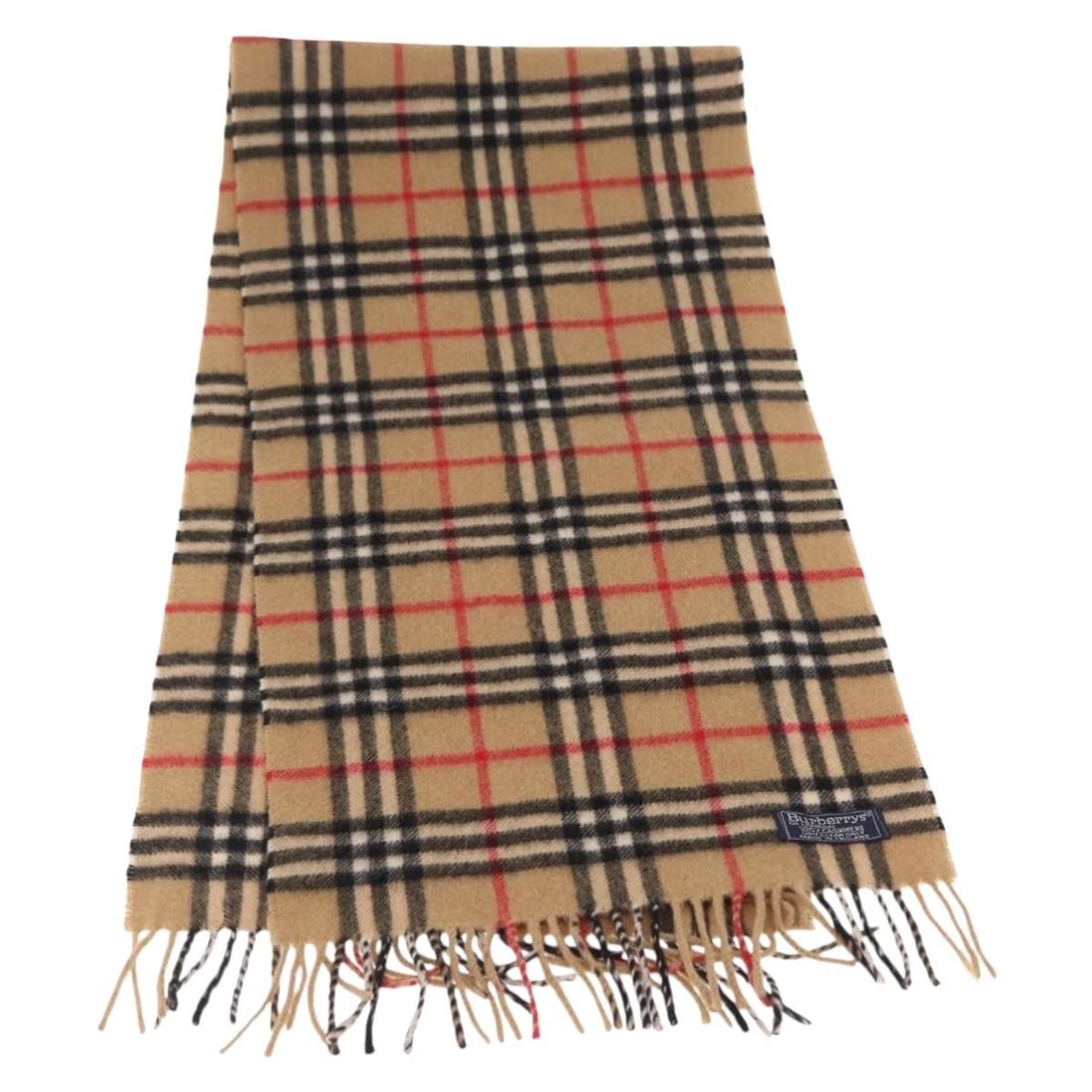 Beige Wool Scarf by Burberrys Nova Check Pattern Made in England: Beige Wool Scarf by Burberrys Nova Check Pattern Made in England This Burberrys Nova Check wool scarf features the iconic check pattern in beige. Crafted from wool, it offers both warmth and classic s
