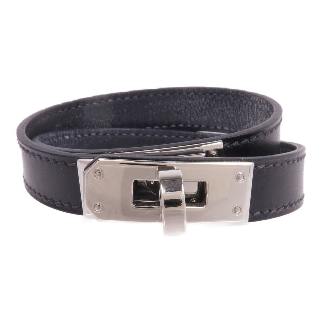 HERMES Kelly Double Tour Bracelet Black Calfskin Leather: HERMES Kelly Double Tour Bracelet Black Calfskin Leather This exquisite HERMES Kelly Double Tour Bracelet showcases a sophisticated design crafted from high-quality black calfskin leather. The bracele