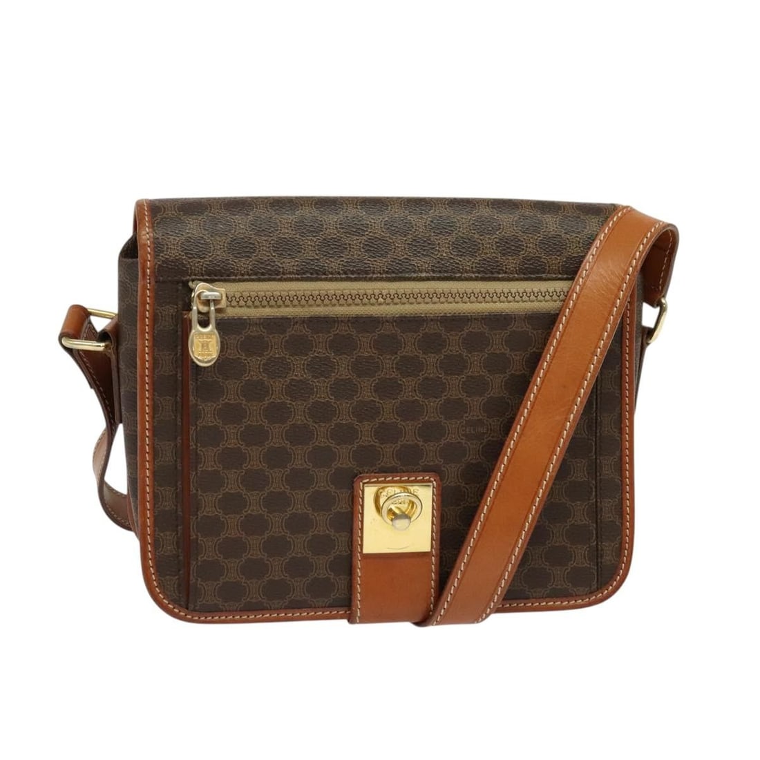 Celine Macadam Canvas Shoulder Bag Vintage Brown: Celine Macadam Canvas Shoulder Bag Vintage Brown This Celine Vintage Macadam Shoulder Bag features a classic brown canvas exterior with leather accents. Designed for unisex use, it offers a timeless s