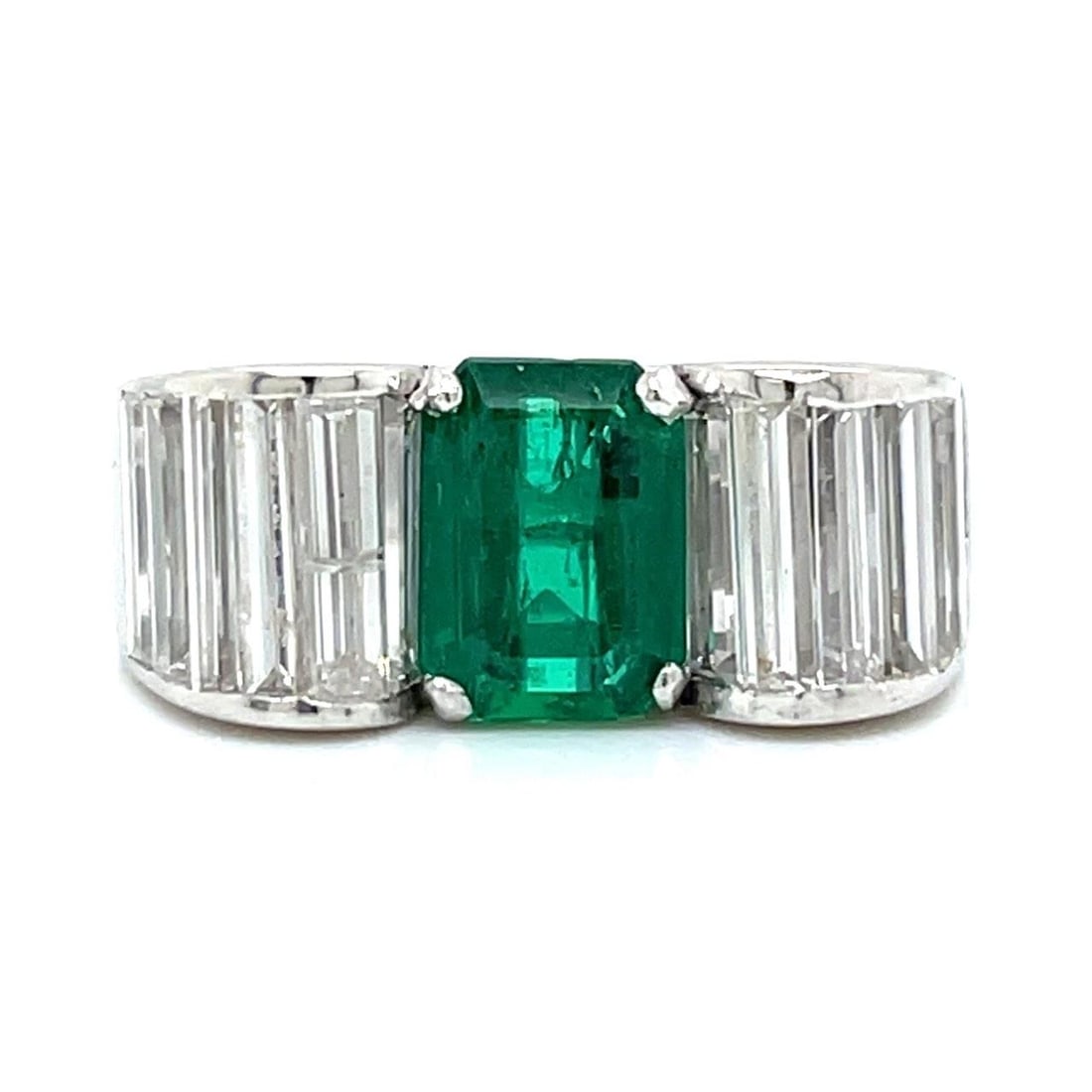 Art Deco Platinum Ring with 1.60 Ct Colombian Emerald and 2.80 Ct Diamonds: Art Deco Platinum Ring with 1.60 Ct Colombian Emerald and 2.80 Ct Diamonds This exquisite Art Deco ring features a stunning Colombian emerald and diamonds, crafted in luxurious platinum. The centerpie