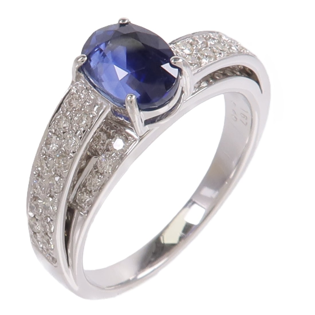 JEWELRY 18K White Gold Sapphire Diamond Ring US 6.75: JEWELRY 18K White Gold Sapphire Diamond Ring US 6.75 This elegant women's ring features a striking blue sapphire set in 18K white gold. The ring is designed in a classic style and is sized at US 6.75.