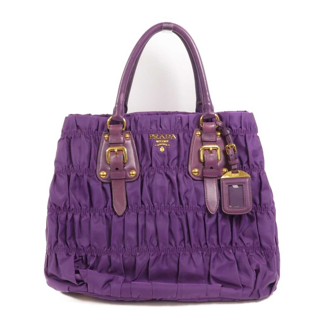 Prada BN2805 Nylon Purple Handbag GHW: Prada BN2805 Nylon Purple Handbag GHW This PRADA handbag features a chic ciclamino purple nylon exterior, offering both durability and style. Designed for women, the bag has a regular size and provide