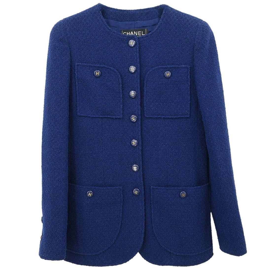 Chanel navy collarless button jacket size 36: Chanel navy collarless button jacket size 36 This Chanel single breasted collarless jacket is crafted from a blend of wool, cotton, and nylon, offering a comfortable and stylish mid-length design. The