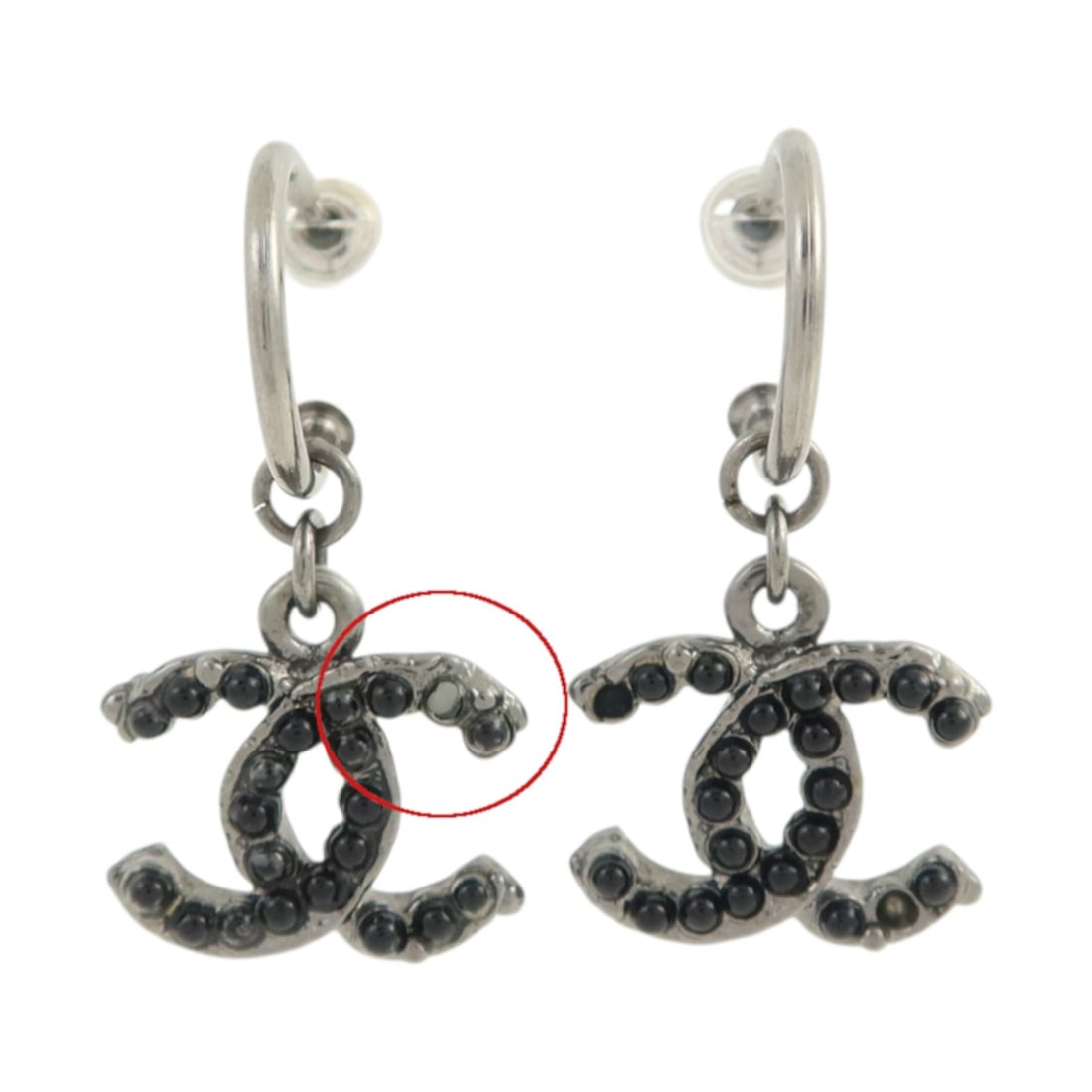 Black CC Logo Pierced Earrings by CHANEL for Women: Black CC Logo Pierced Earrings by CHANEL for Women These CHANEL CC earrings feature a black metal design with the iconic CC logo. Designed for pierced ears, they offer a stylish accessory option for w