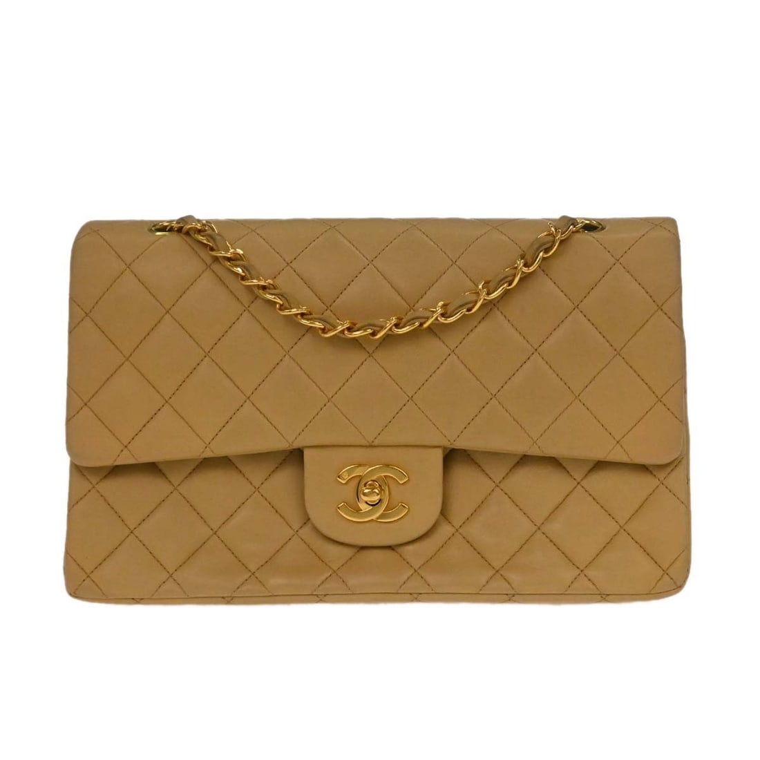 CHANEL Matelasse Beige Lambskin Medium Double Flap Shoulder Bag: CHANEL Matelasse Beige Lambskin Medium Double Flap Shoulder Bag This Chanel Medium Classic Double Flap Bag is crafted from beige lambskin leather and features the signature matelasse quilting. It is d