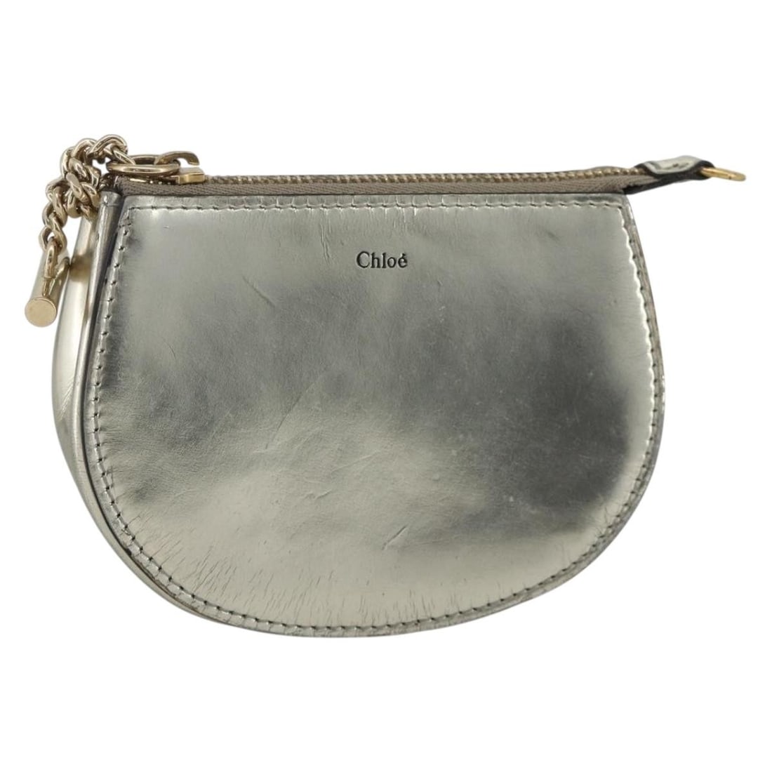 Chloe Leather Pouch Silver and Gold Toned Small Bag with Box: Chloe Leather Pouch Silver and Gold Toned Small Bag with Box This Chloe pouch is crafted from leather with a silver and gold exterior. Designed for women, it offers a compact size, making it ideal for