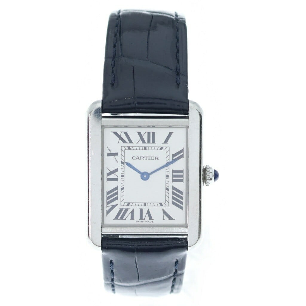 Cartier Tank Solo SM Quartz Wristwatch Silver Dial Leather Strap: Cartier Tank Solo SM Quartz Wristwatch Silver Dial Leather Strap This Cartier Tank Solo SM wristwatch features a classic silver dial, stainless steel case, and a leather strap. Powered by a reliable q